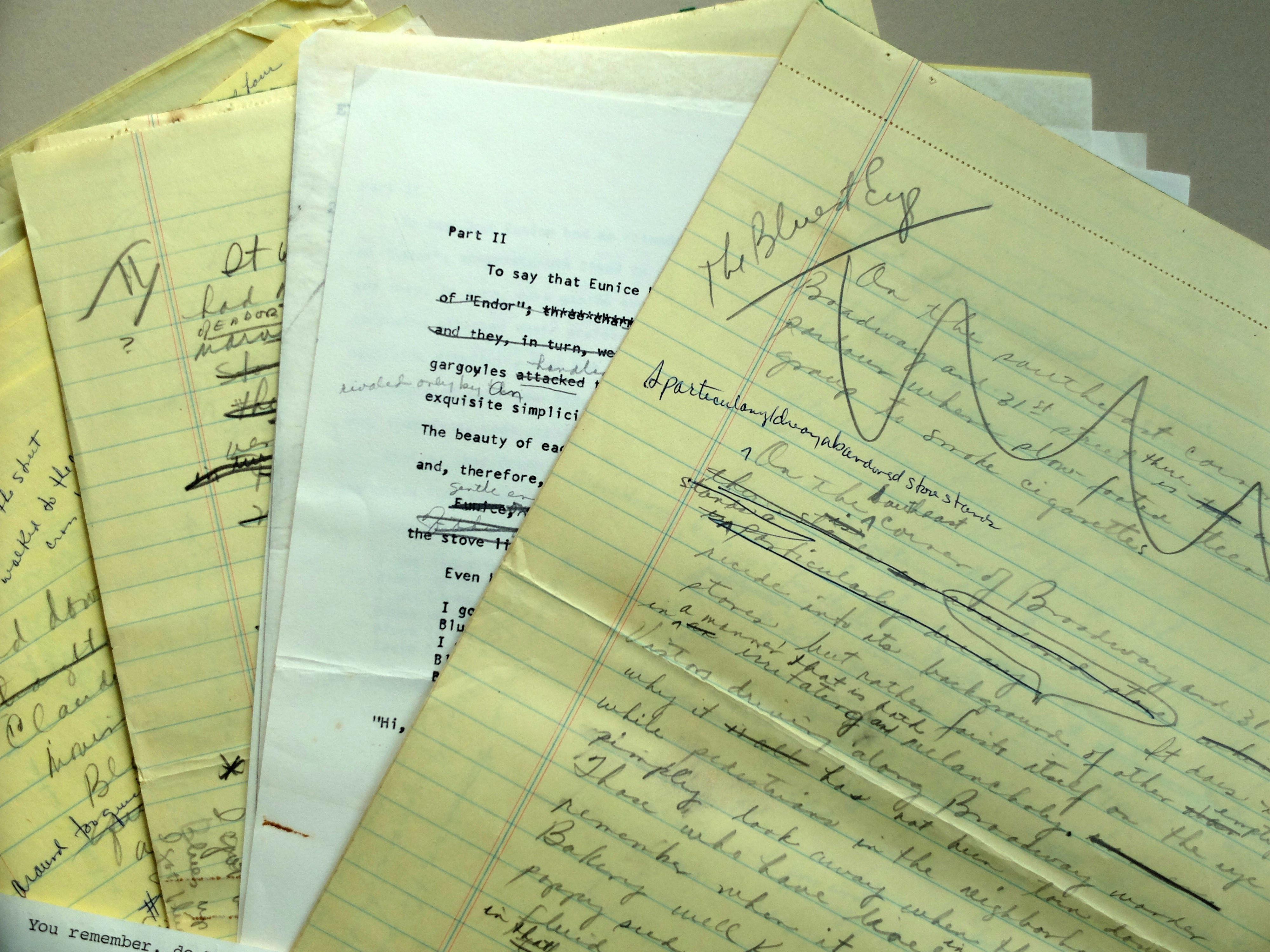 Handwritten draft of “The Bluest Eye” (1970) on yellow legal paper and other early manuscript drafts