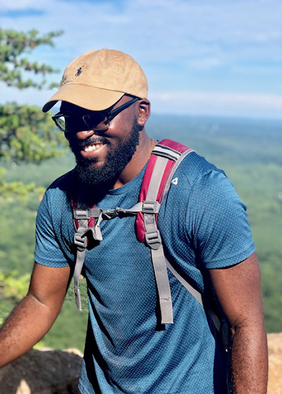 Photo of Robert Lee-Faison on a hike