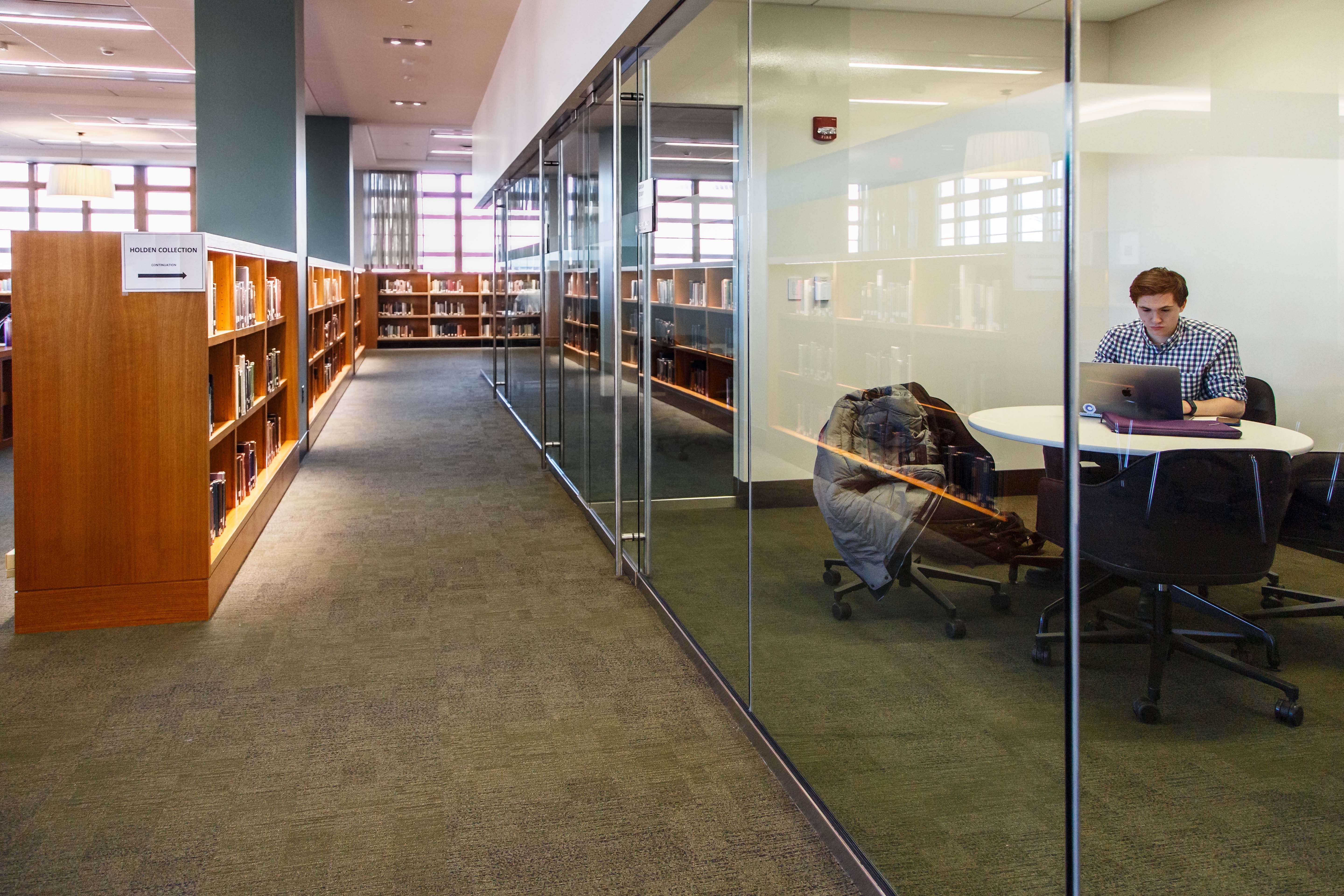 Firestone Library first floor, north side, which includes shelves and group study rooms