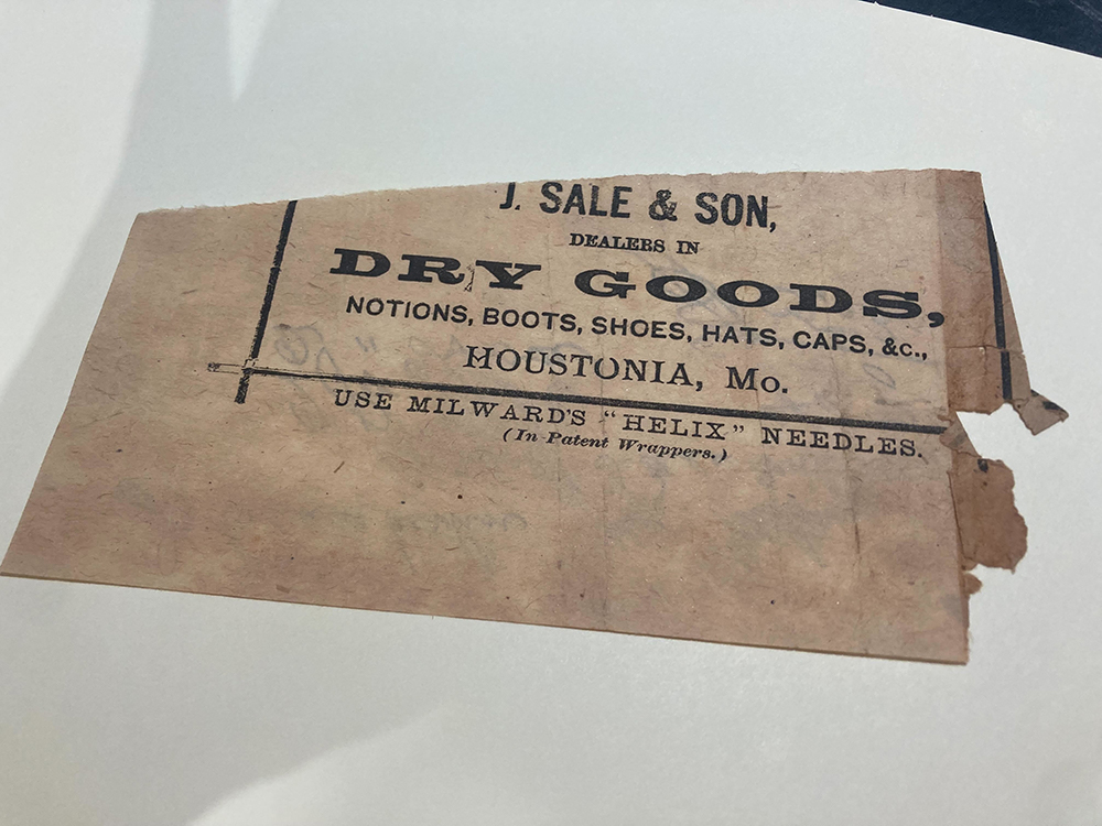 Ephemera of newspaper advertise for dry good store from Chamberlain collection.  