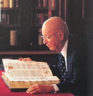 William H. Scheide examines the Gutenberg Bible.